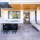 sydney construction companies Outside barbeque area with relaxed seating and wooden ceiling - Modern outdoor patio - Home Renovation