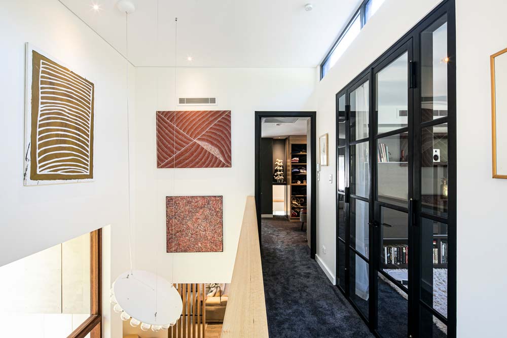 beautiful renovations Woronora Home Renovation - corridor to the bedroom - White walls and black door frames